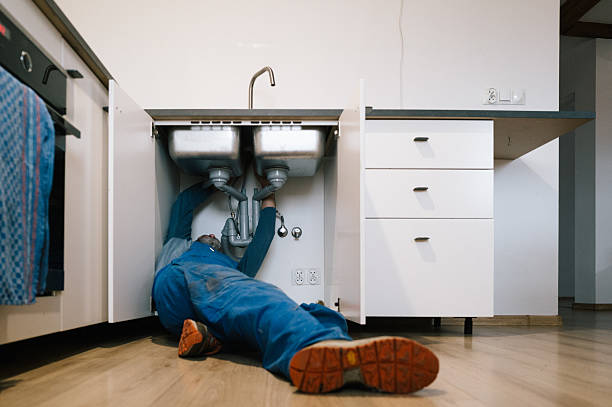 Professional Emergency Plumber technician working in Hammondsville, OH